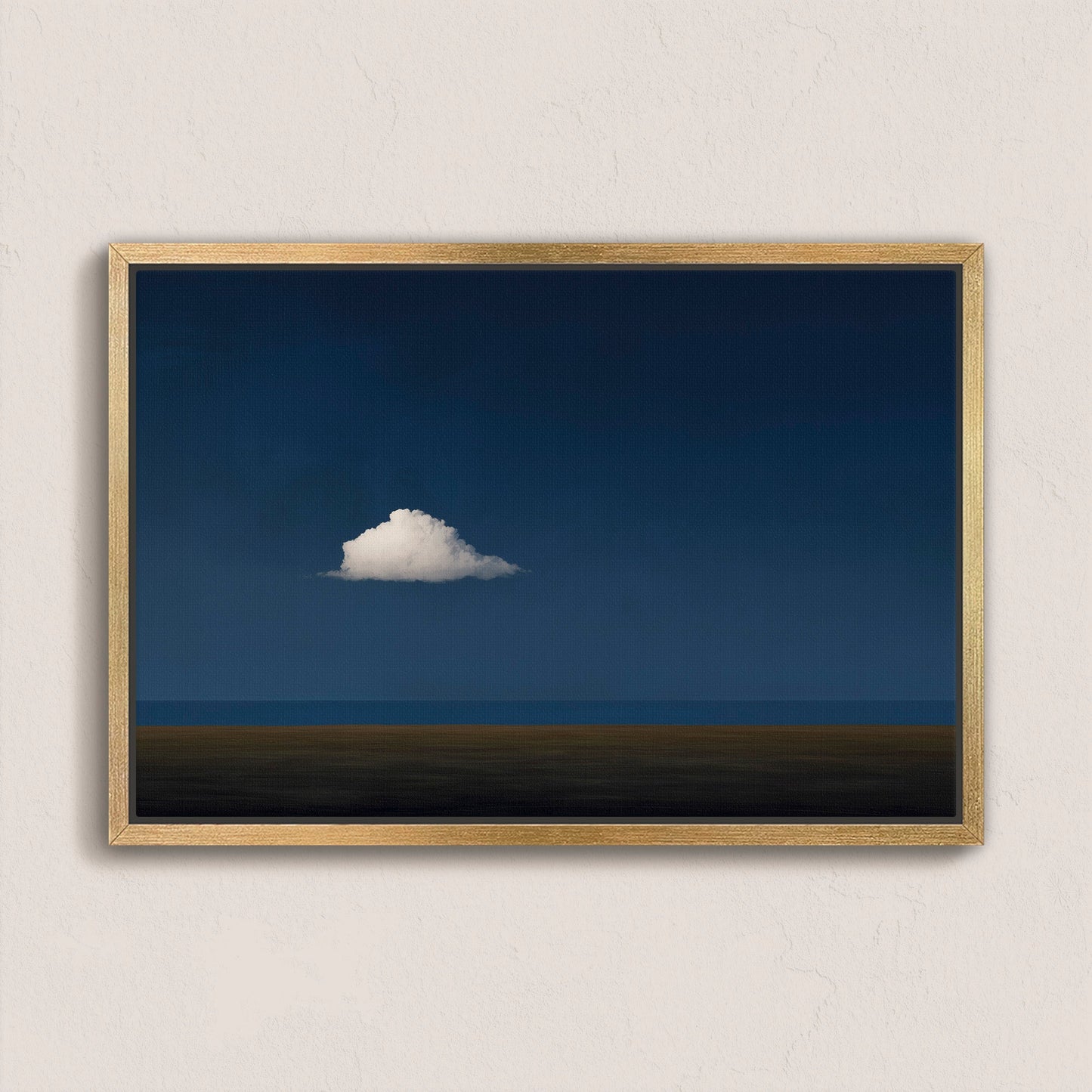 Nimbus Canvas Print featuring a solitary white cloud over a deep midnight blue horizon in a natural wood frame