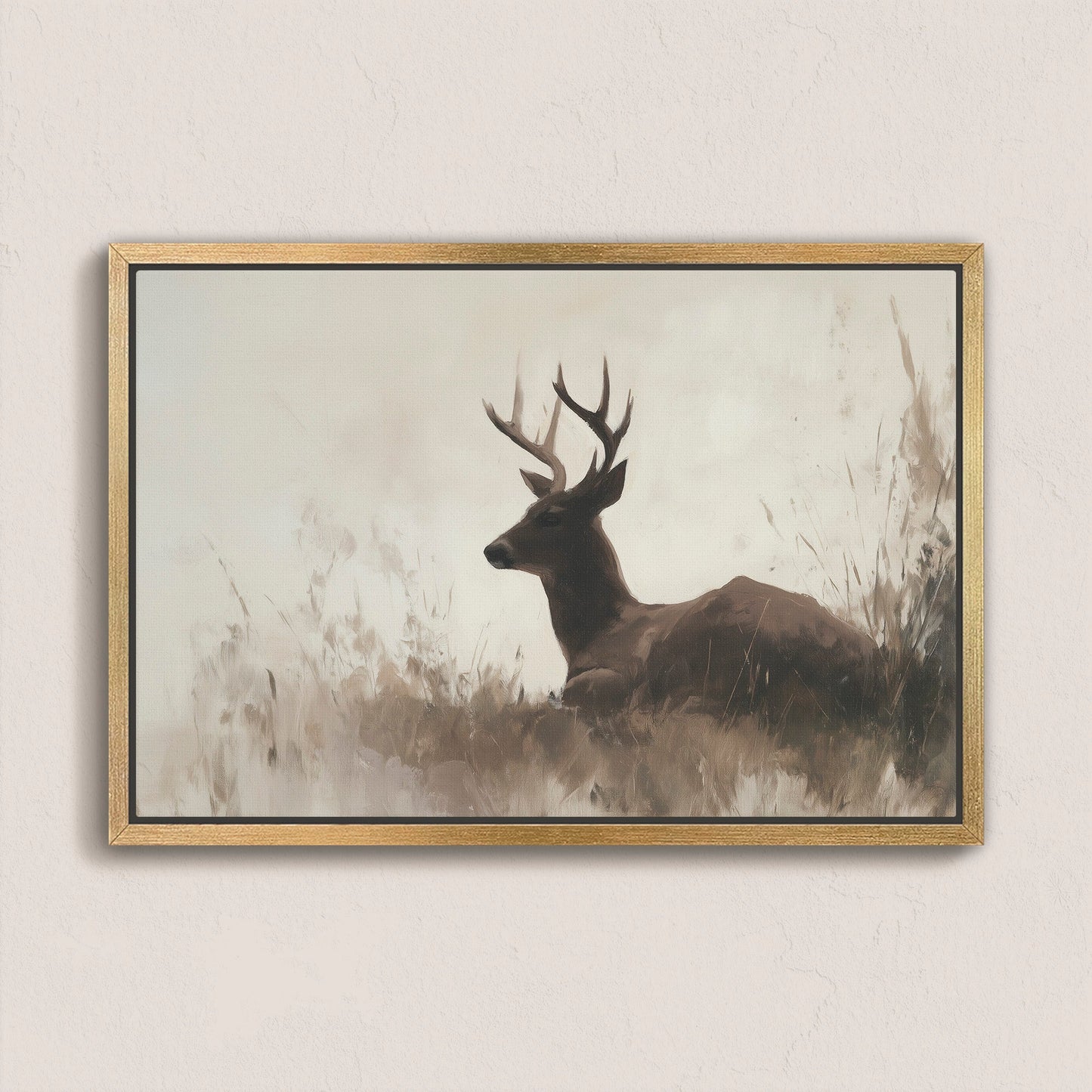 Haven Canvas Print of a resting deer in soft grasses with neutral, warm tones in a natural wood frame