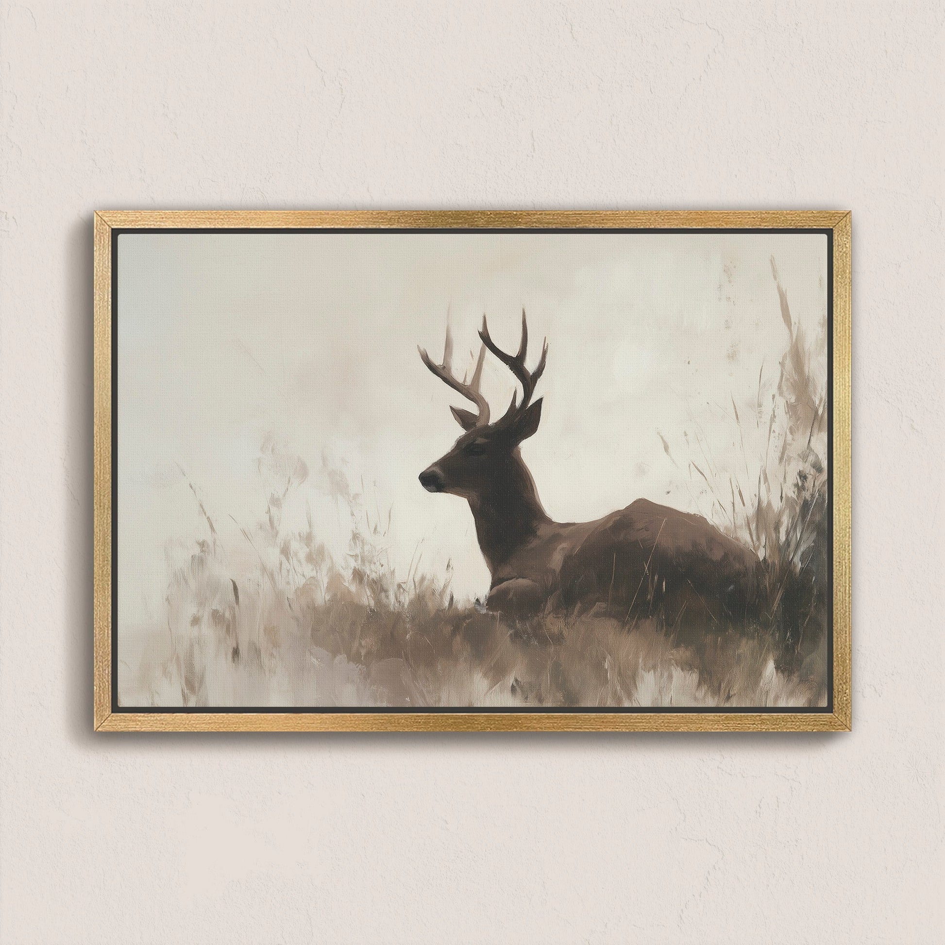 Haven Canvas Print of a resting deer in soft grasses with neutral, warm tones in a natural wood frame