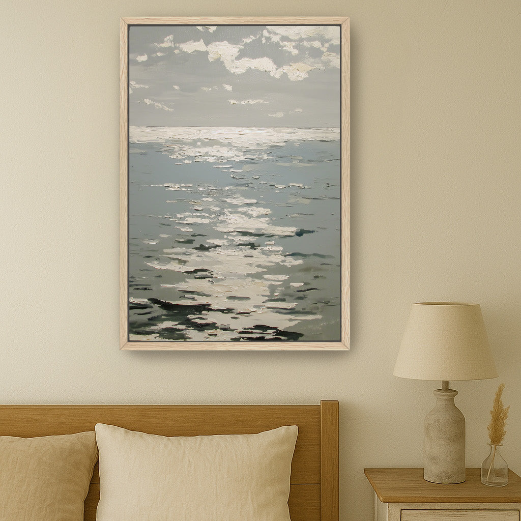 a serene bedroom scene with a large painting of a calm ocean hanging on the wall above a bed with a wooden headboard.