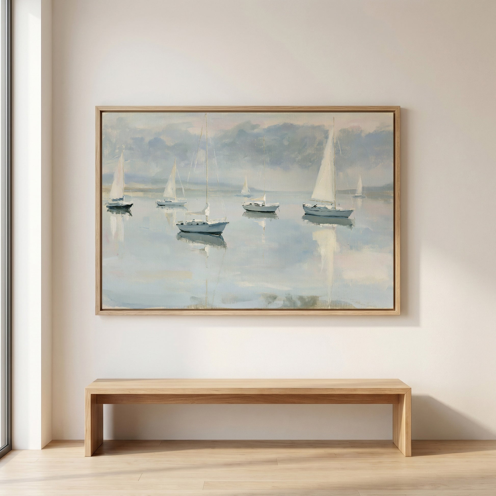 a large painting of sailboats on a calm body of water, hanging on a wall above a wooden bench.