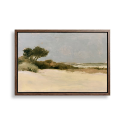 The image is a framed painting depicting a serene landscape with a sandy beach, trees, and a cloudy sky.