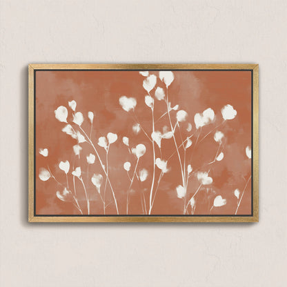 Ember canvas print with white floral silhouettes on terracotta background in natural wood frame