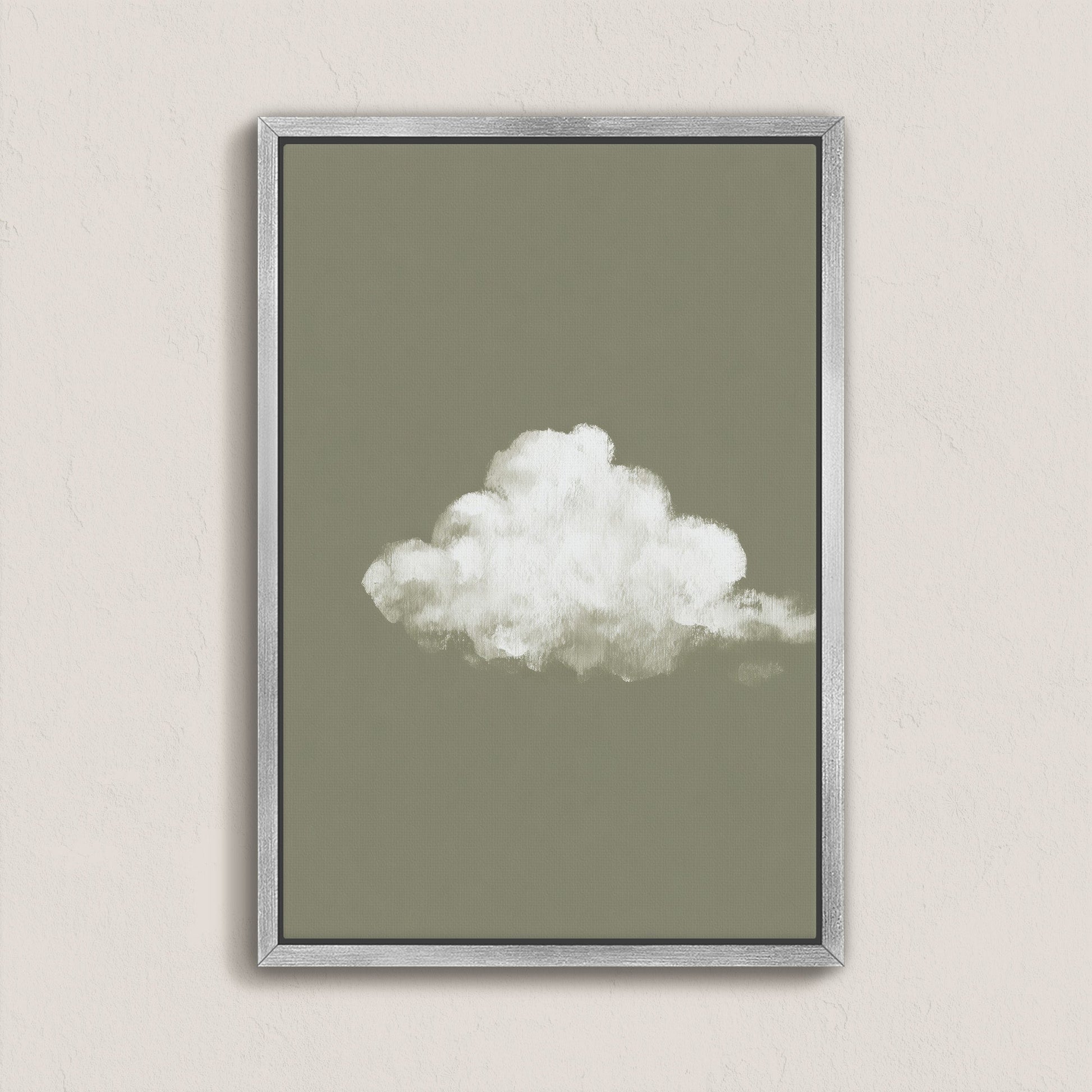 Trace Canvas Print featuring a single white cloud on muted sage background in a silver frame, offering calm and simplicity for modern interiors