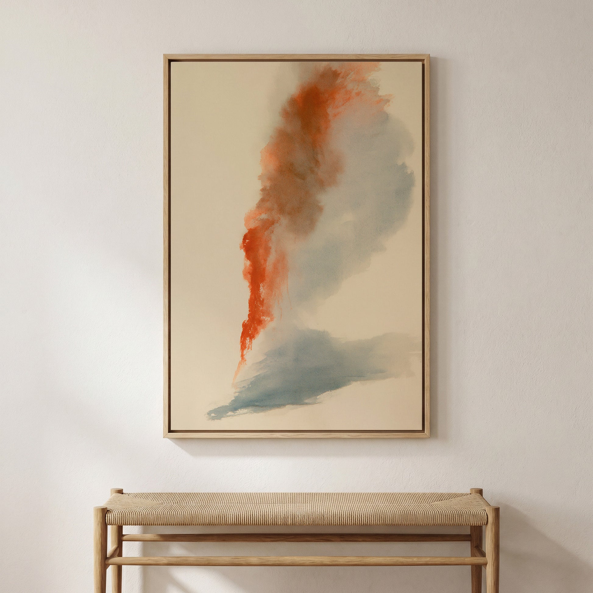 a large abstract painting hanging on a white wall above a wooden bench.