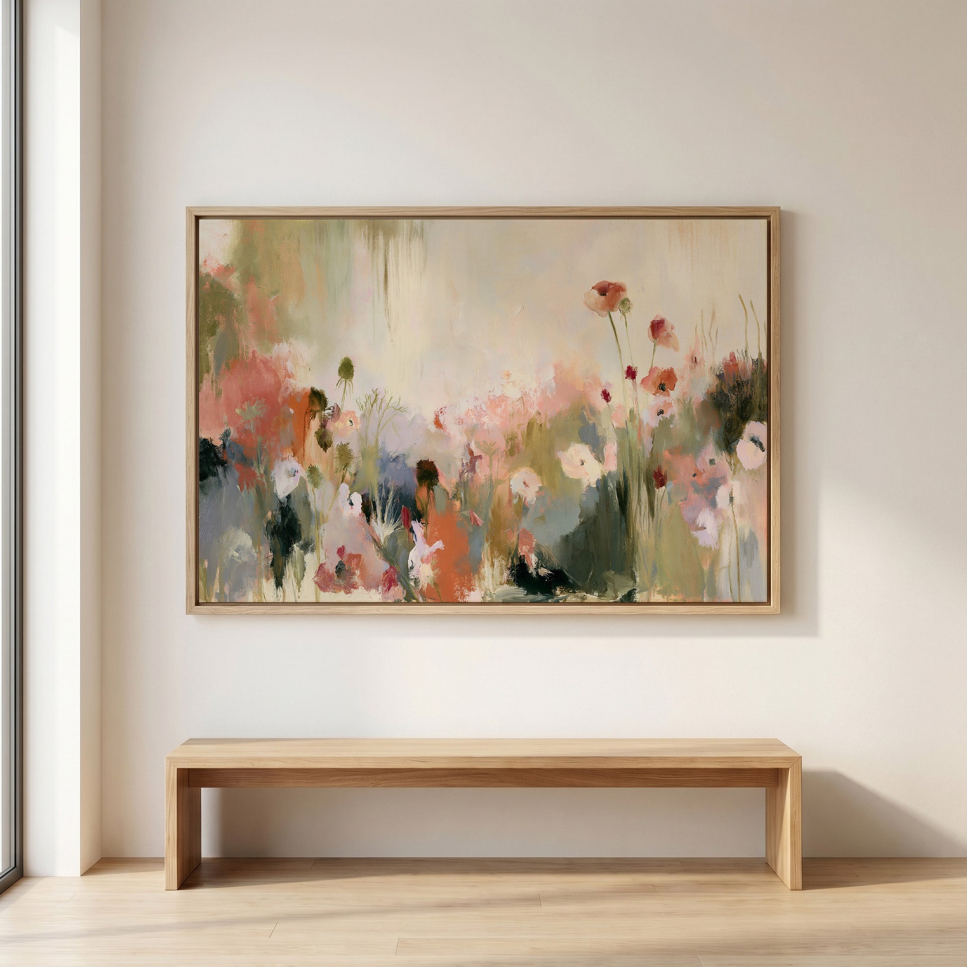 a large, colorful painting of flowers hanging on a wall above a wooden bench.