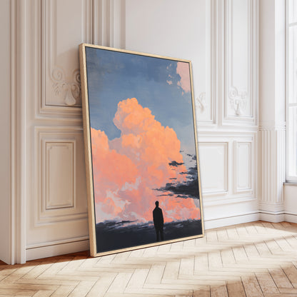 a large framed painting depicting a person standing in front of a picturesque sky with clouds and a sunset.