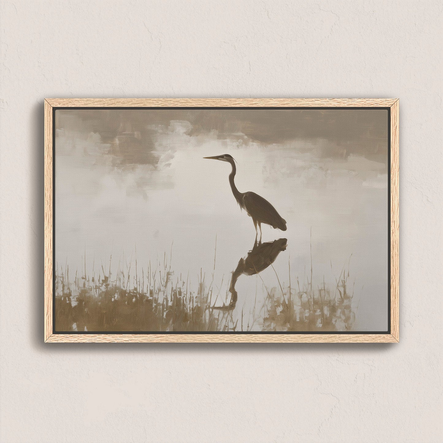 Wade canvas print of a heron standing in calm water with muted earth tones and soft light in a natural wood frame