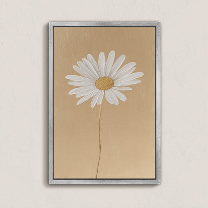 'Bloom' canvas print featuring a single white daisy on a golden-beige background with a silver frame, minimalist floral wall art