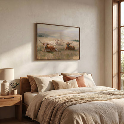 a serene bedroom scene with a large bed, a framed painting of cows in a field, and a lamp on a side table.