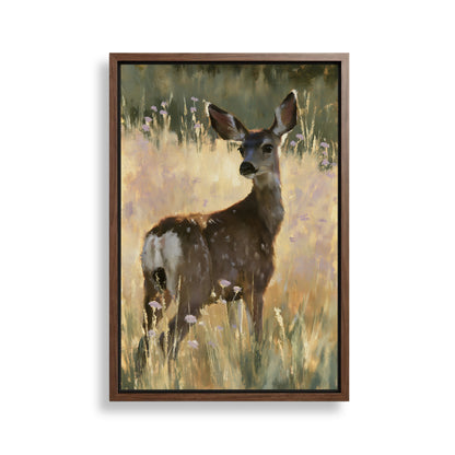 A deer standing in a field of tall grass and wildflowers.