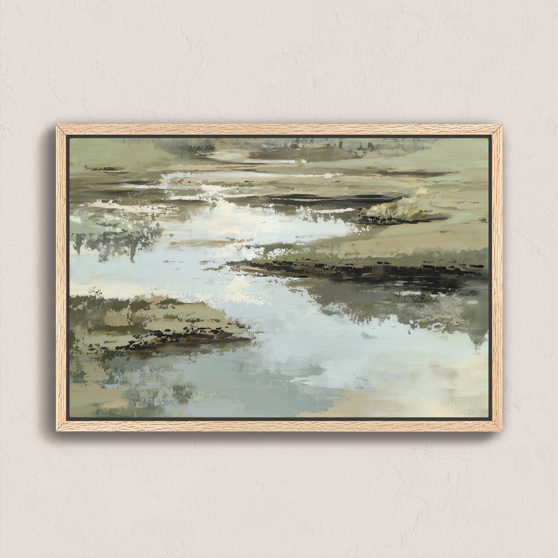 Reed canvas print depicting calm water and earth in layered sage, sand, and ivory tones with a natural wood frame