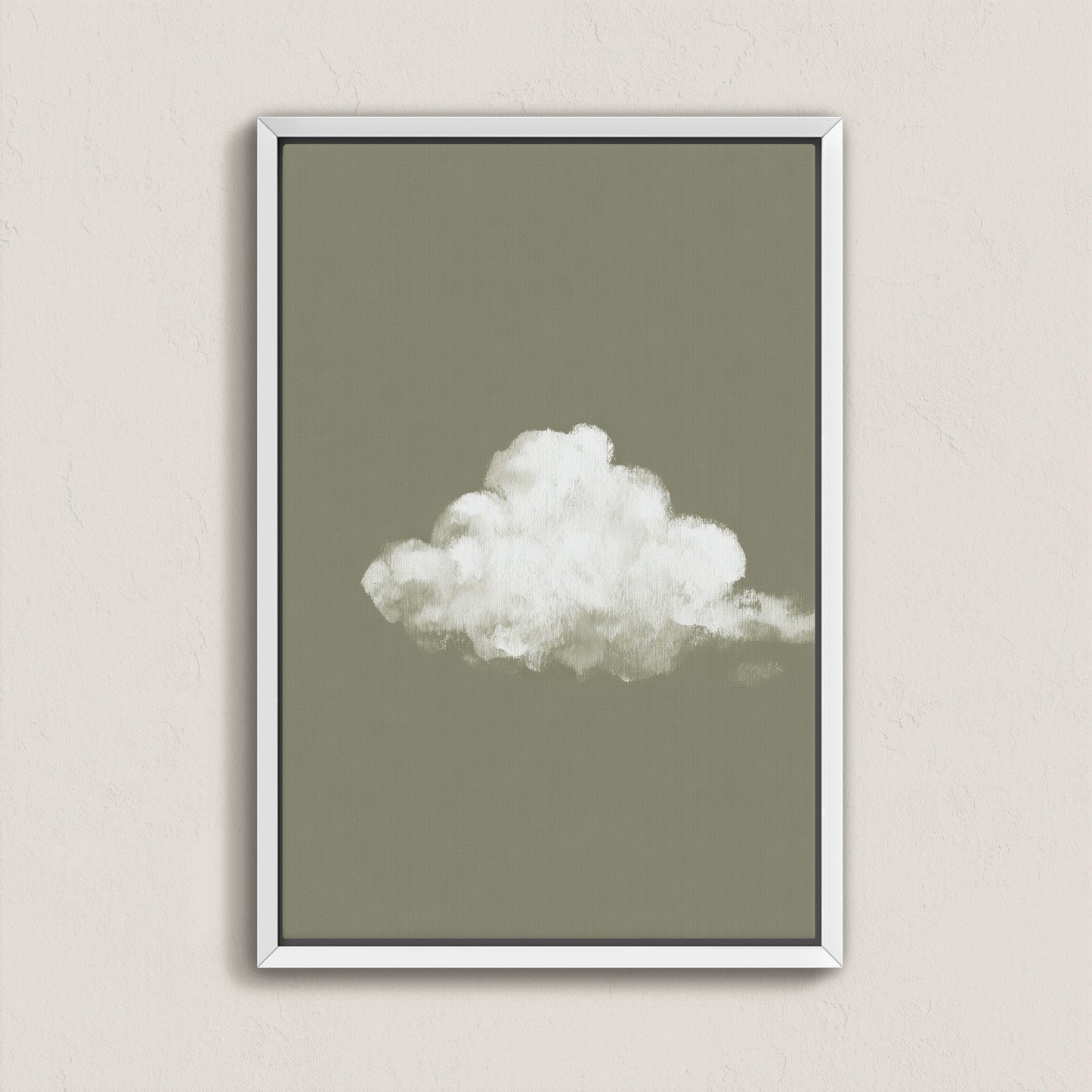 'Trace' canvas print featuring a single white cloud on muted sage background in a white frame
