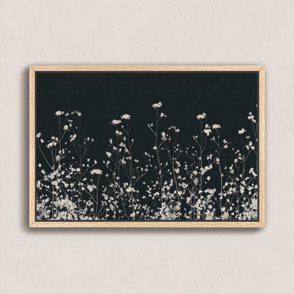Noiré Canvas Wall Art with delicate white florals on deep charcoal background in natural wood frame