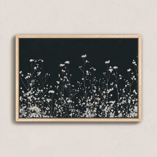 Noiré Canvas Wall Art with delicate white florals on deep charcoal background in natural wood frame