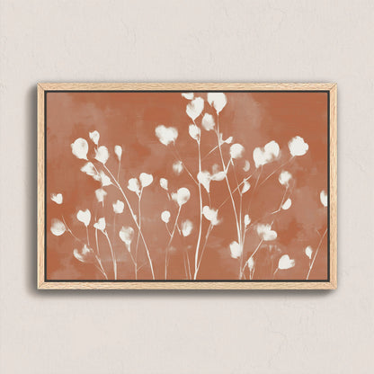 Ember canvas print with white floral petals on terracotta background in natural wood frame