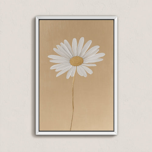 'Bloom' canvas print of a single white daisy on a soft golden-beige background in a sleek white frame