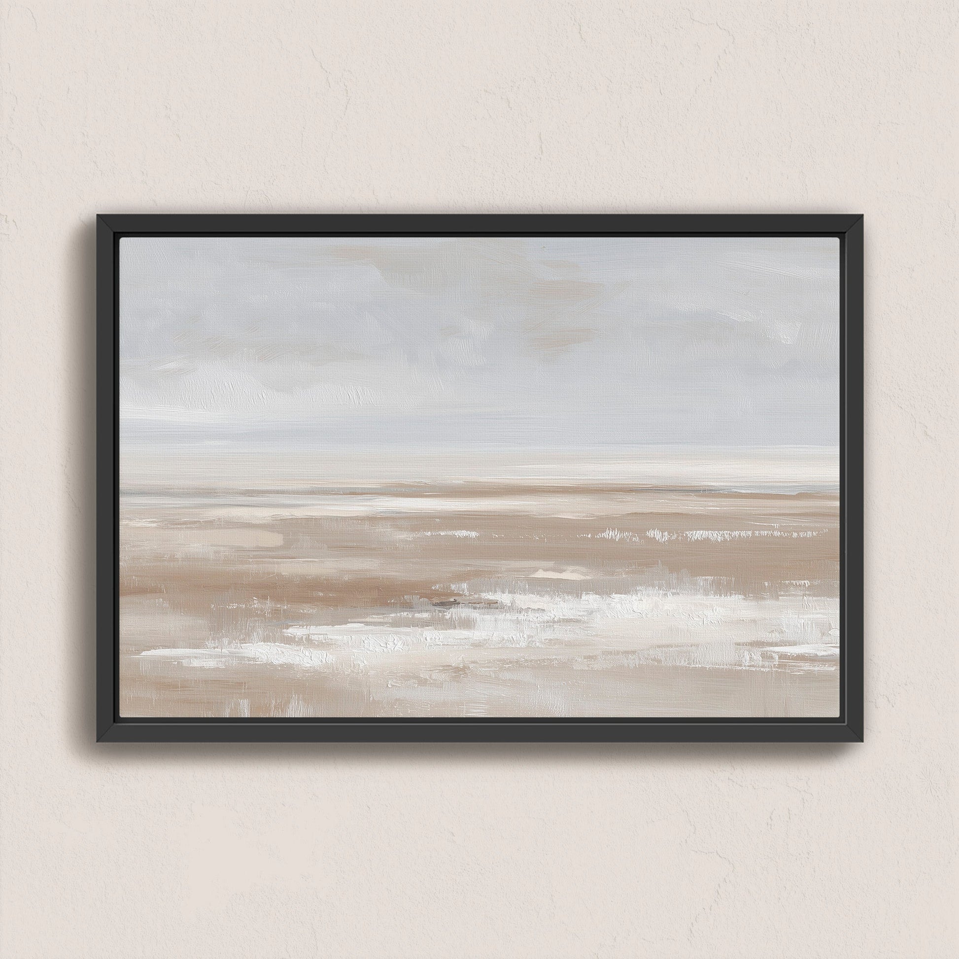 Barren Canvas Print minimalist landscape in taupe cream and sand tones with black frame hanging on beige wall