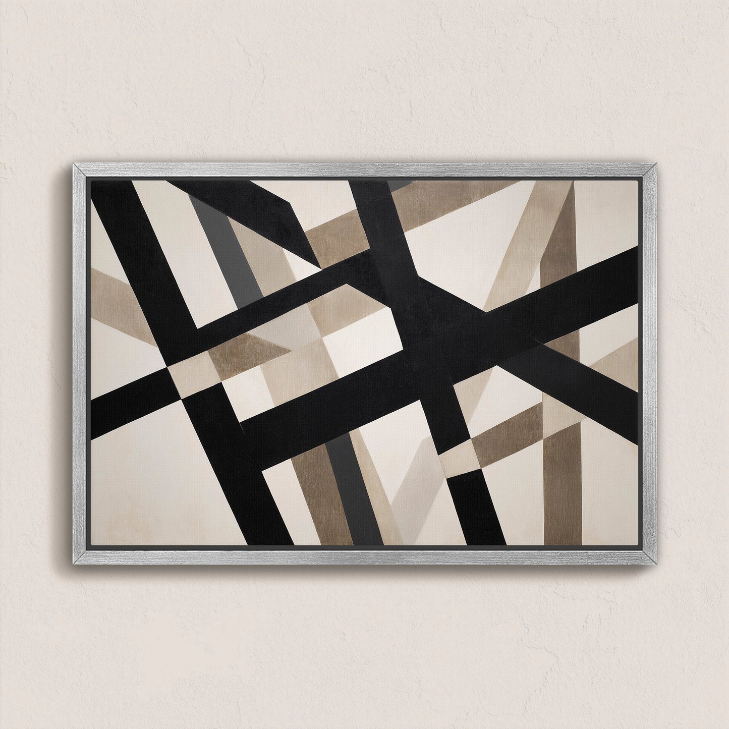Axis Canvas Print featuring bold geometric black and neutral intersecting lines in a silver frame on beige wall