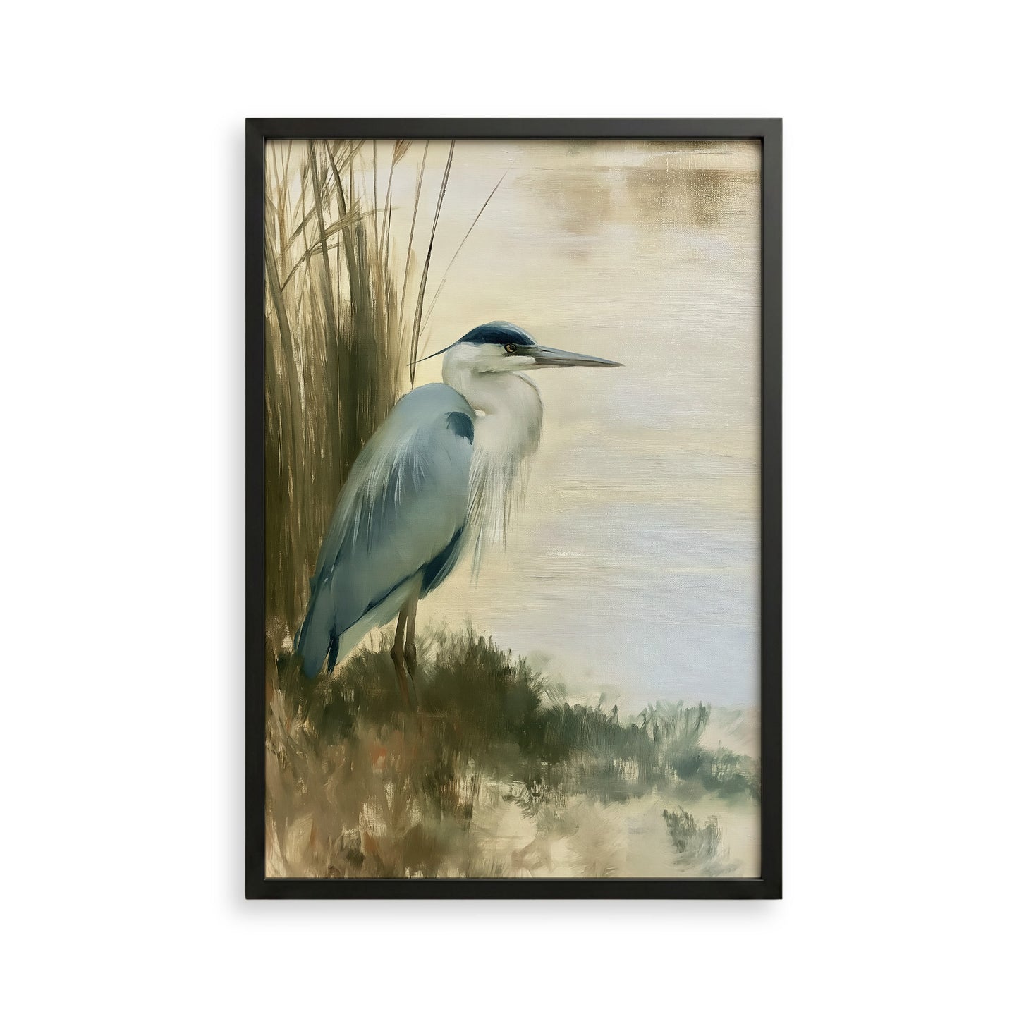 A blue heron standing on the bank of a body of water, with tall grasses in the background.
