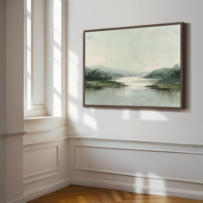a large landscape painting hanging on a white wall, depicting a serene scene of a river surrounded by trees and mountains.
