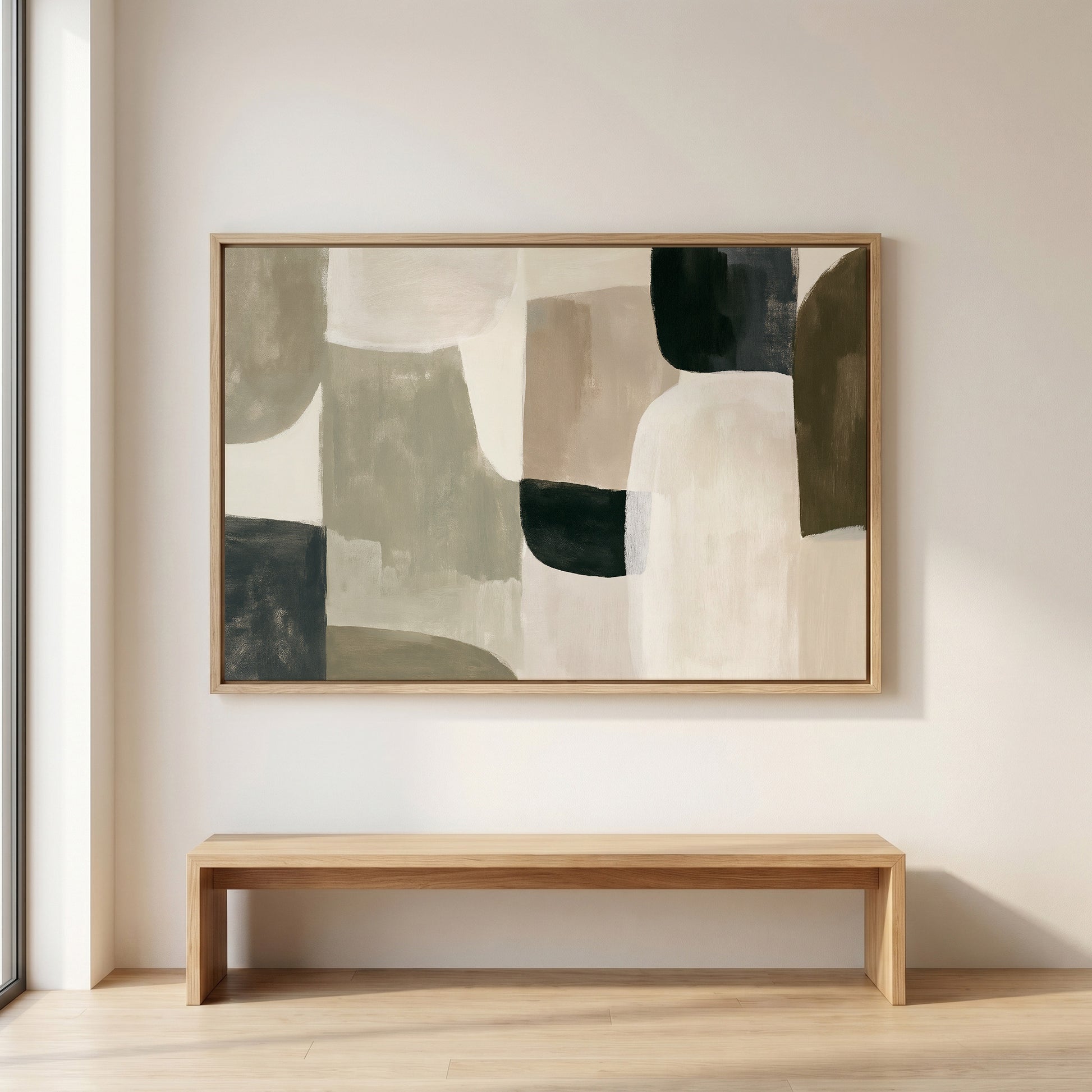 a large abstract painting hanging on a white wall above a wooden bench.