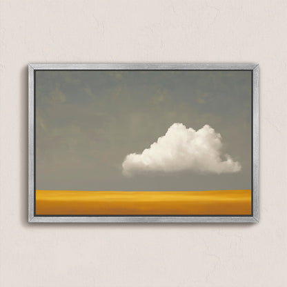 Mellow canvas print featuring a white cloud over a golden plain with a muted gray sky in a silver frame