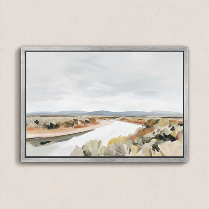Mesa canvas print of a tranquil modern desert landscape with a flowing river and muted earth tones in a silver frame.
