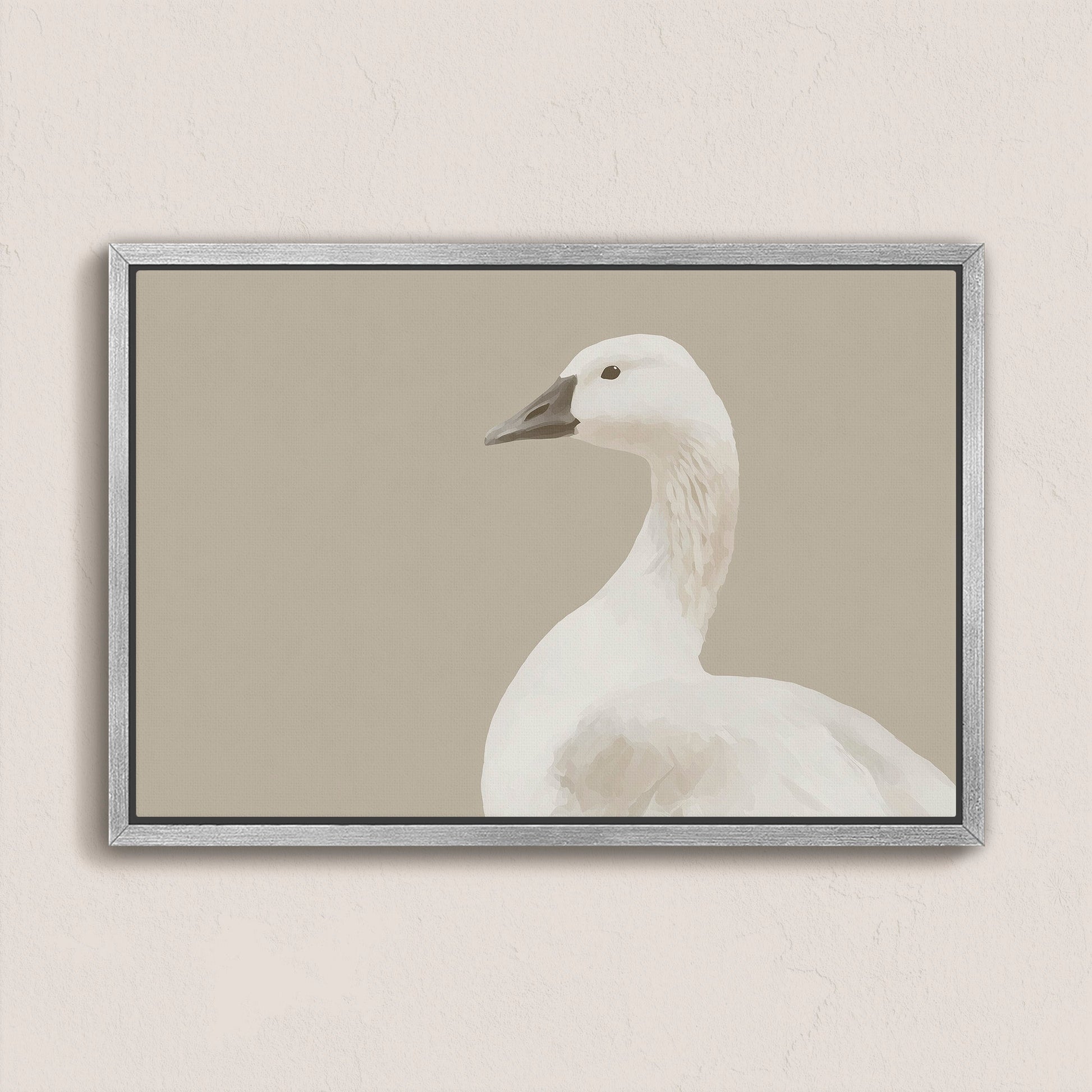 Grace Canvas Print of a white bird in soft cream and beige tones on neutral background, framed in silver, perfect for minimalist and modern decor.