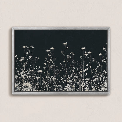 Noiré Canvas Wall Art with delicate white florals on deep charcoal background in silver frame