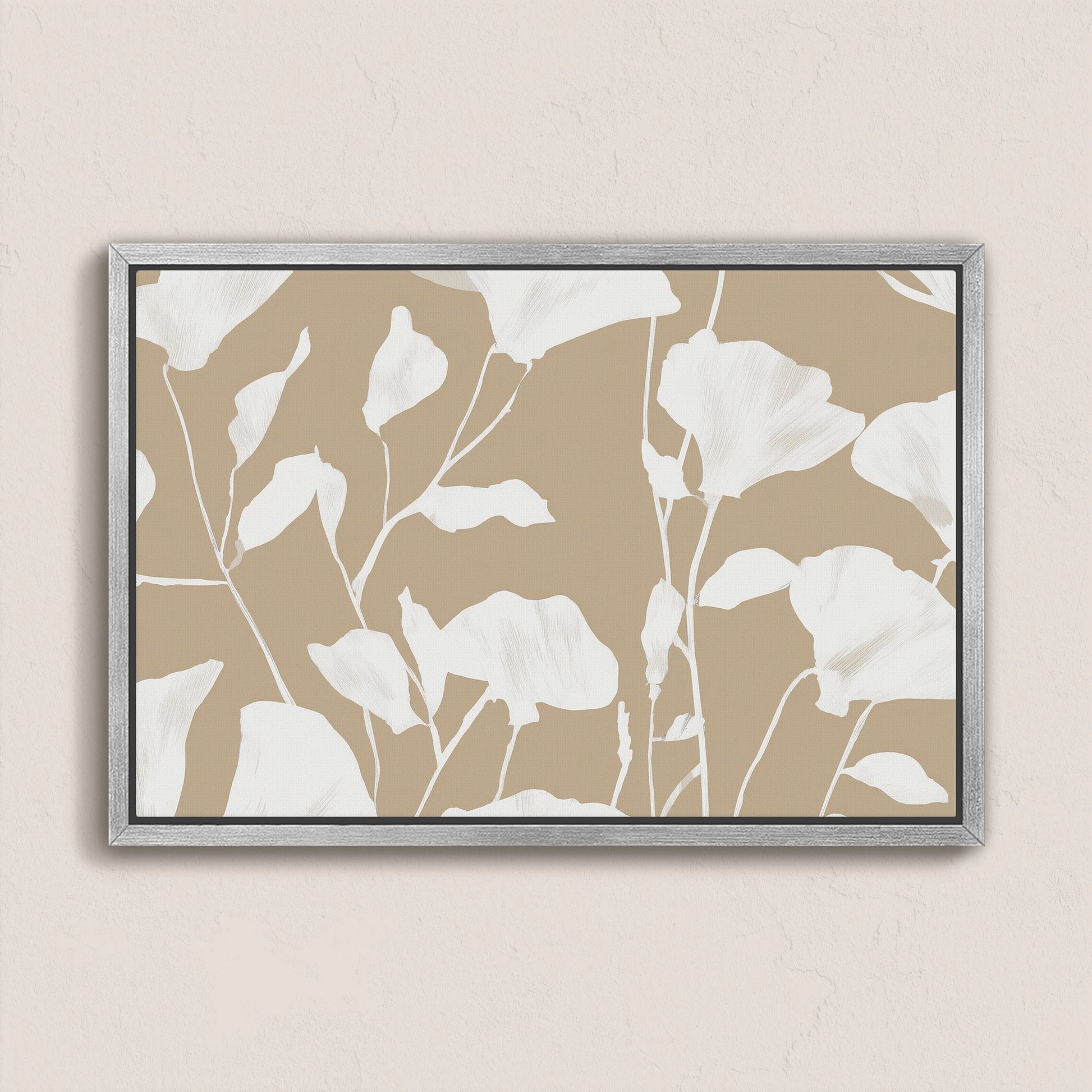 Driftleaf Canvas Print with white floral silhouettes on beige background in a light wood frame