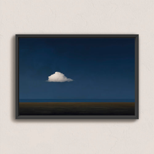 Nimbus Canvas Print featuring a solitary white cloud over a dark blue horizon, framed in black for modern and minimal interiors.