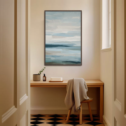 Lapse canvas print of serene sea and sky in soft blue and ivory tones above wooden desk in minimalist room
