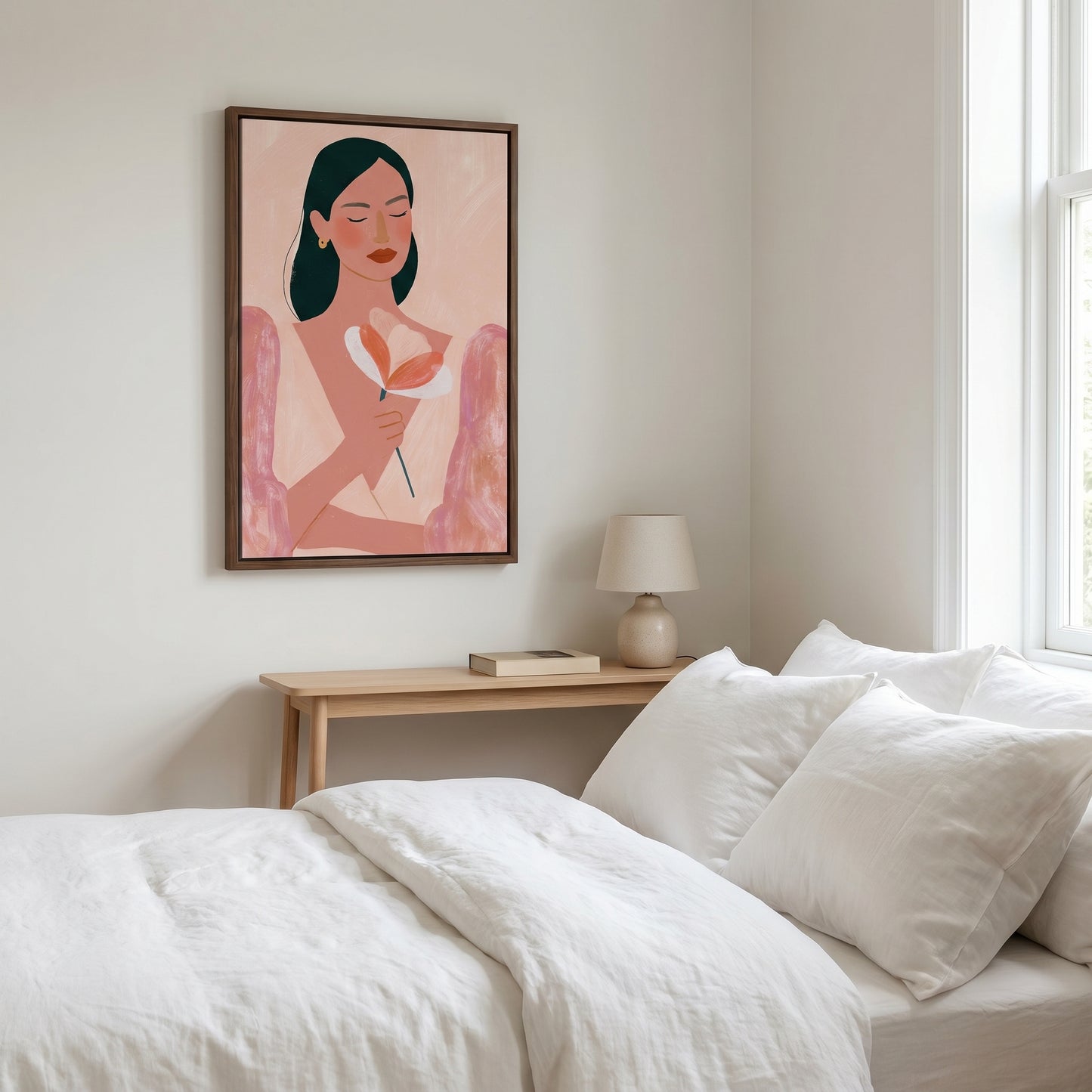 a bedroom with a bed, a nightstand, and a framed artwork of a woman holding a flower.