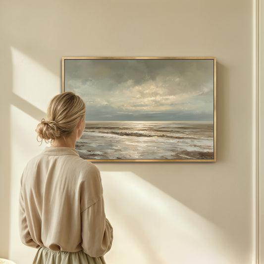 A woman stands in front of a painting, gazing at the serene landscape depicted in the artwork.