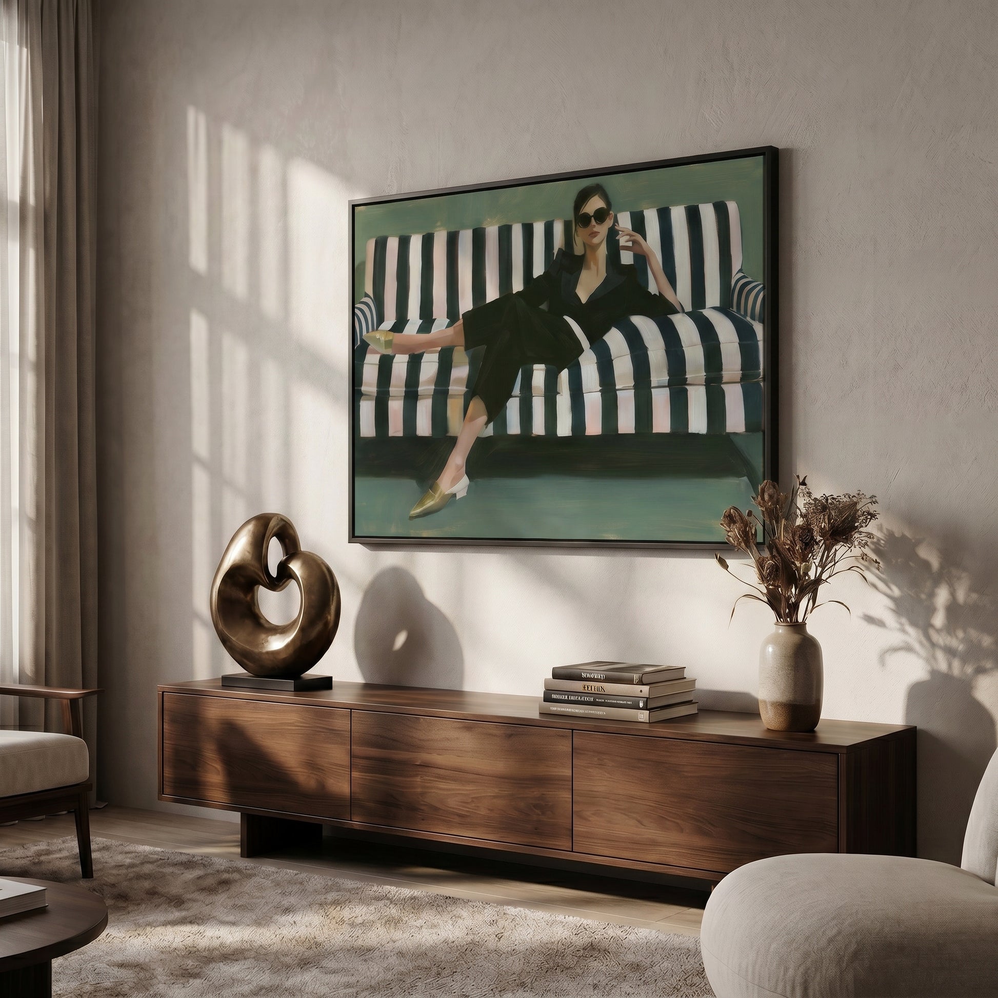 a living room with a large painting of a woman sitting on a striped couch, a wooden entertainment center, and a sculpture on the floor.