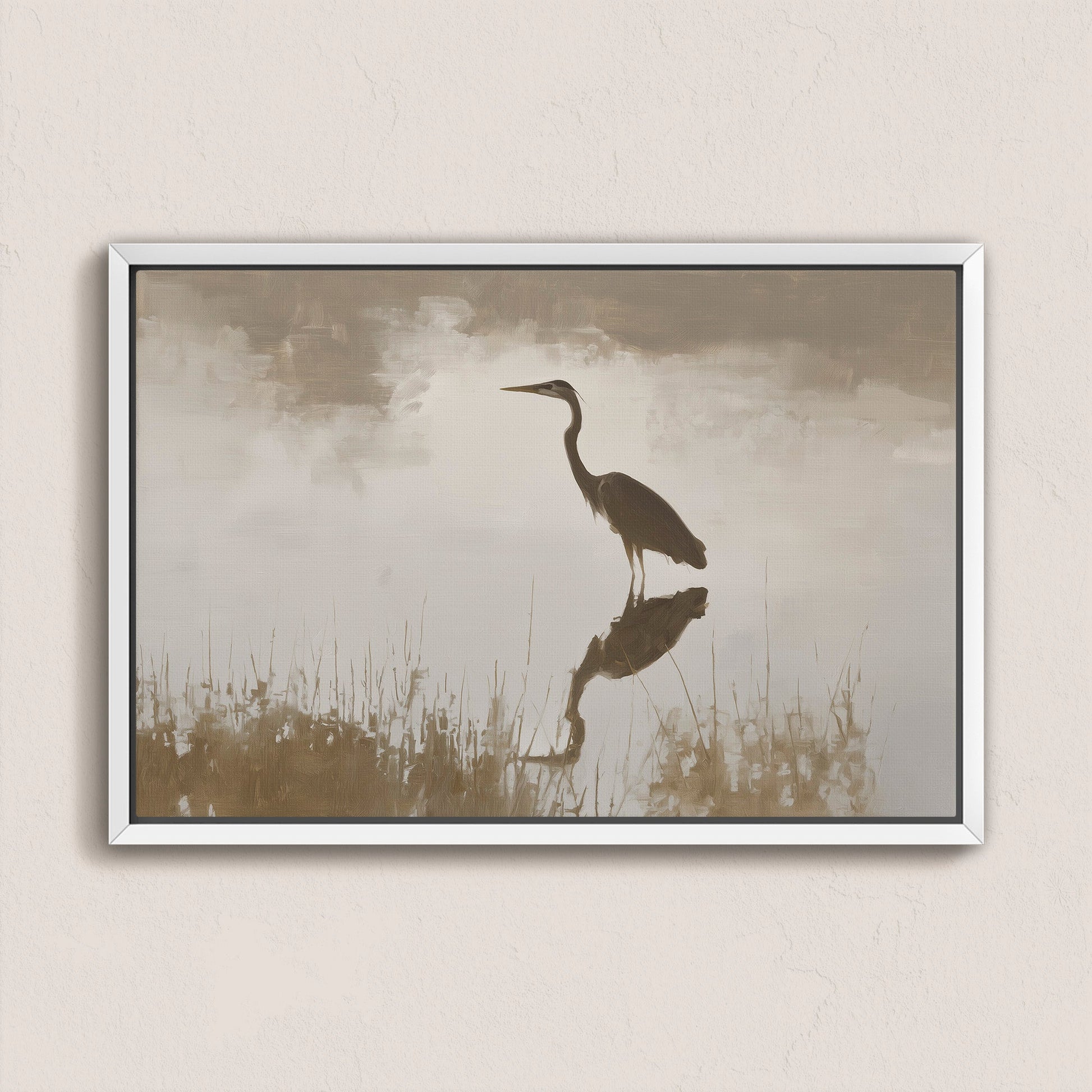 Wade canvas print of a heron standing in calm water with muted earth tones and soft light in a sleek white frame