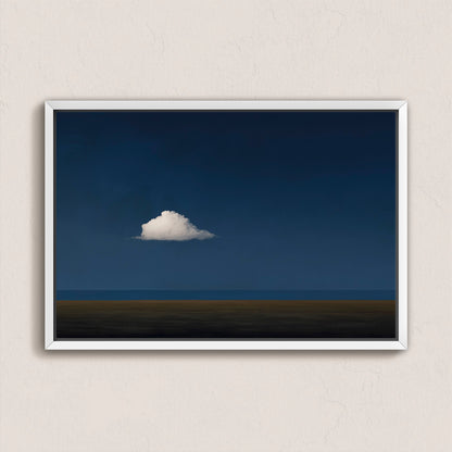 Nimbus canvas print featuring a solitary white cloud over a deep blue horizon in a white frame