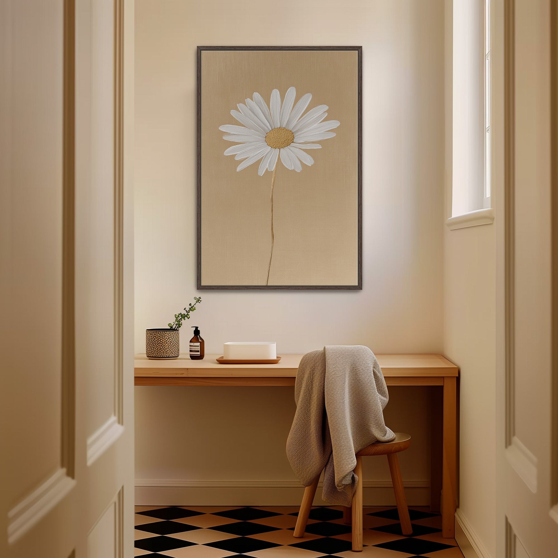 Minimalist "Bloom" canvas print of a single white daisy with golden-beige background in a cozy, modern room.