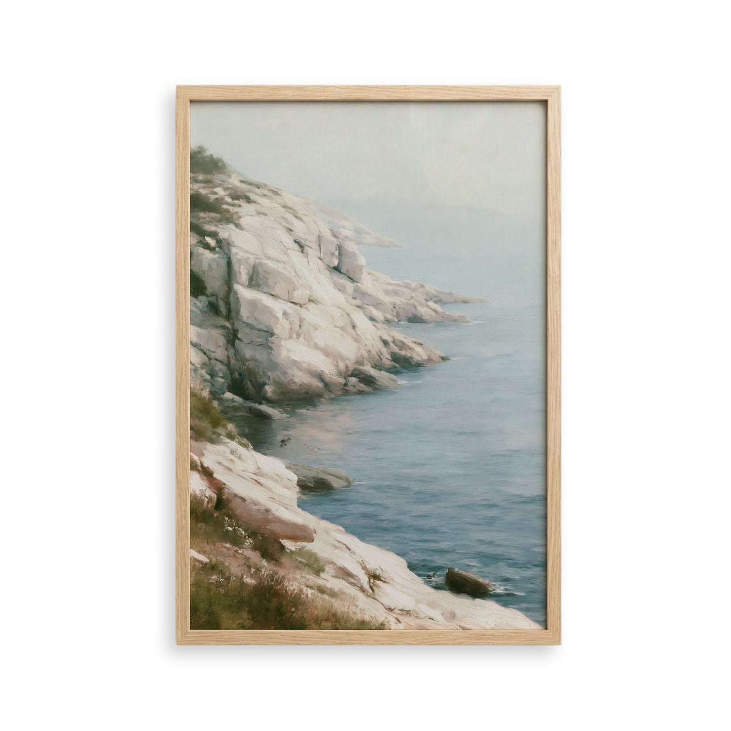 a rocky coastline with a calm, blue ocean in the background.