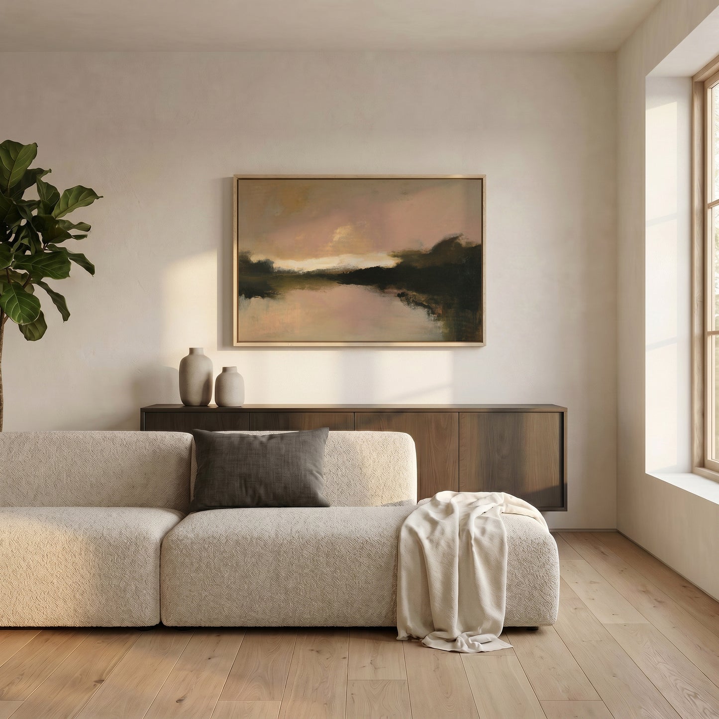a serene living room with a large window, a white sofa, a wooden cabinet, and a framed landscape painting on the wall.