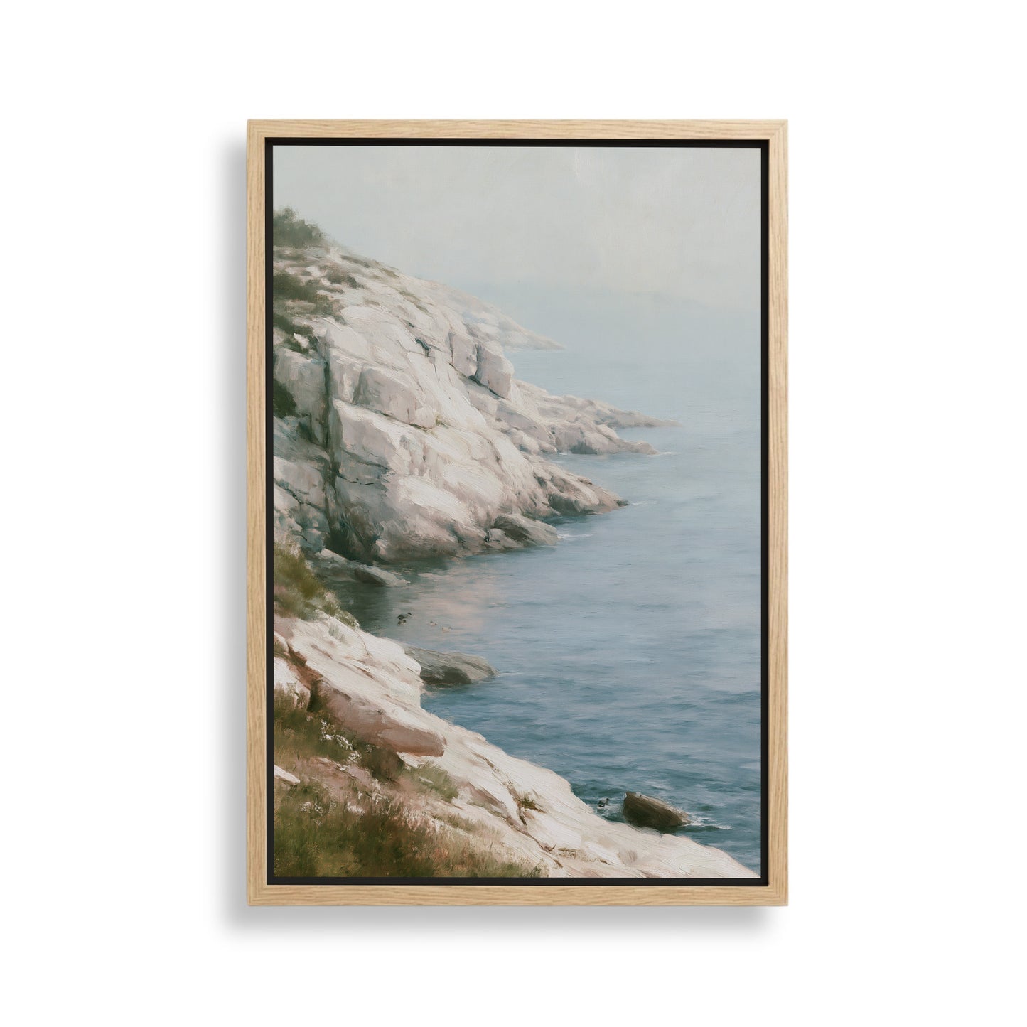 a rocky coastline with a calm, blue ocean in the background.