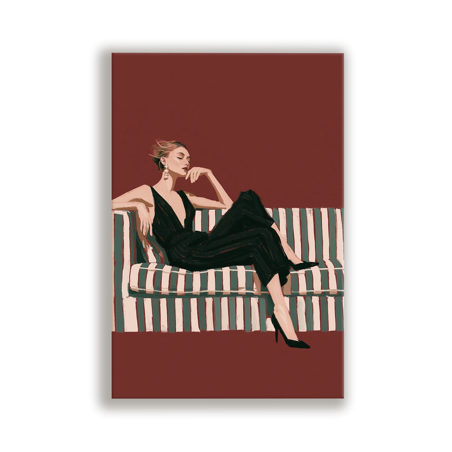 A woman in a black dress is sitting on a striped couch, with her hand on her chin.