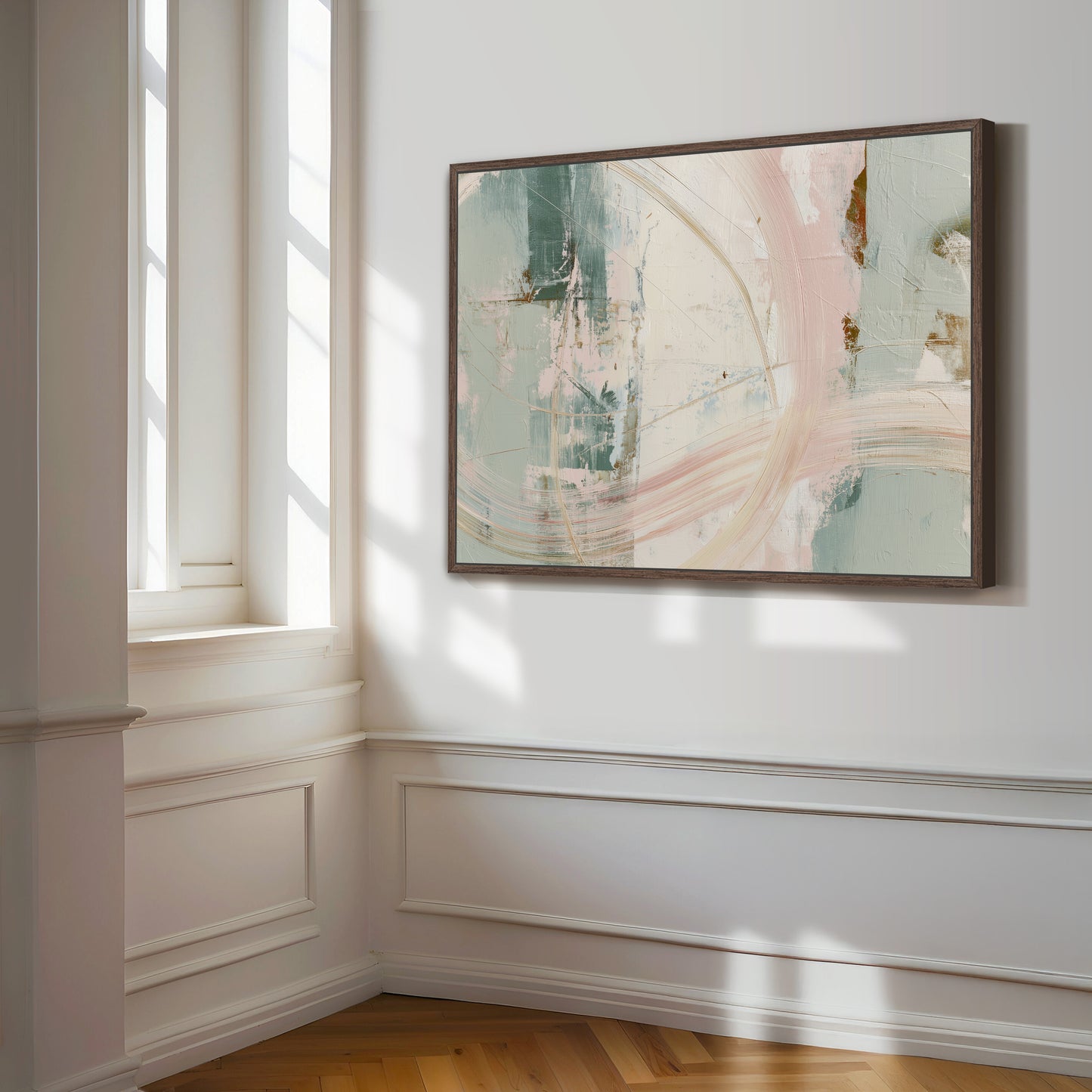 a large abstract painting hanging on a white wall in a room with a wooden floor.