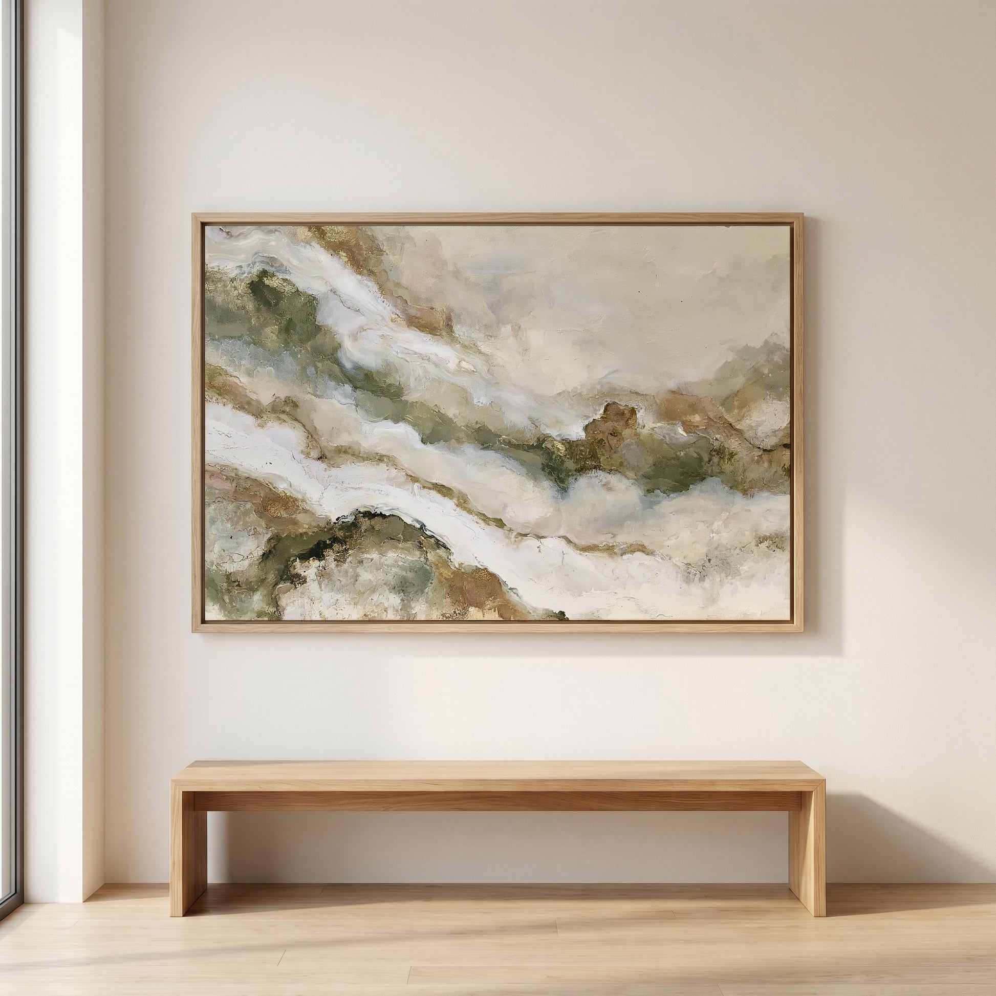 a large abstract painting hanging on a white wall above a wooden bench.