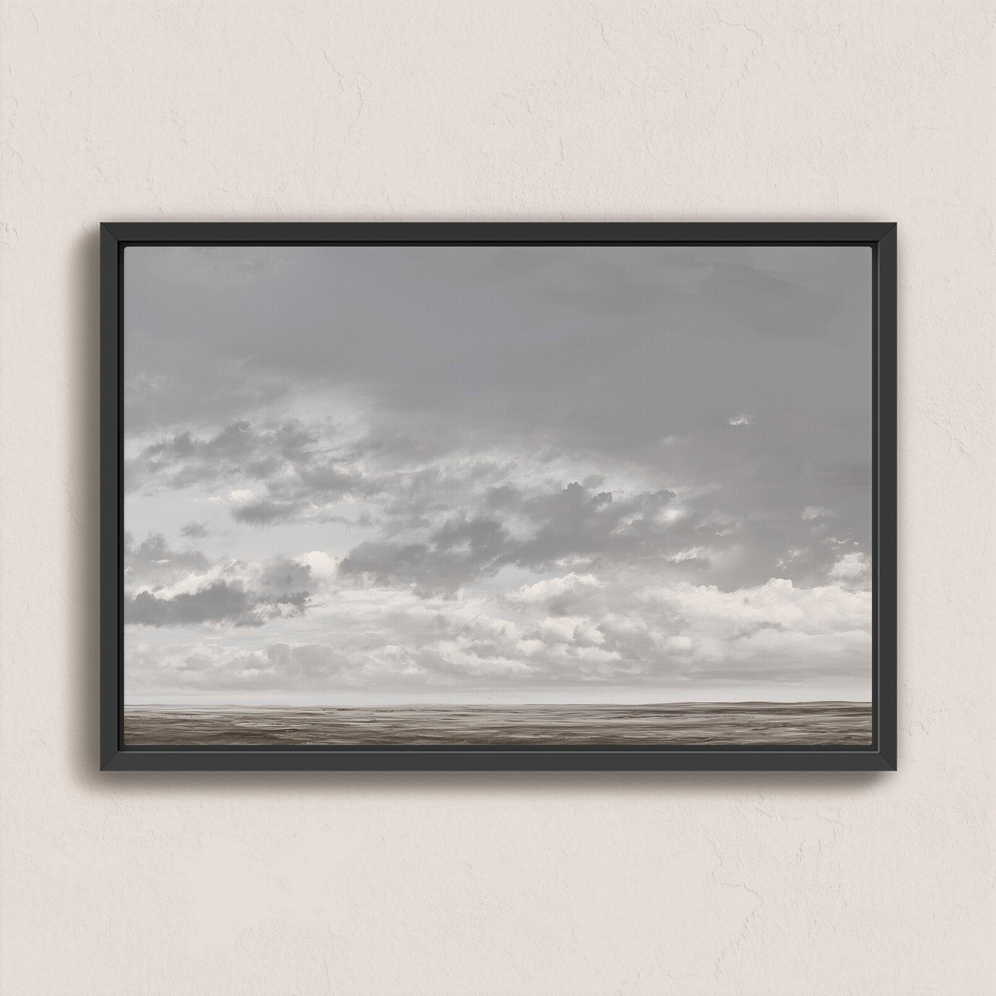 Duskfield Canvas Print framed wall art featuring tranquil gray cloudscape over a calm plain in silvers and taupes, modern coastal decor.