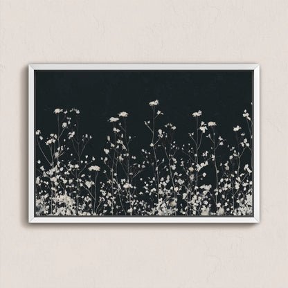 Noiré Canvas Wall Art featuring delicate white florals on deep charcoal background in a sleek white frame.