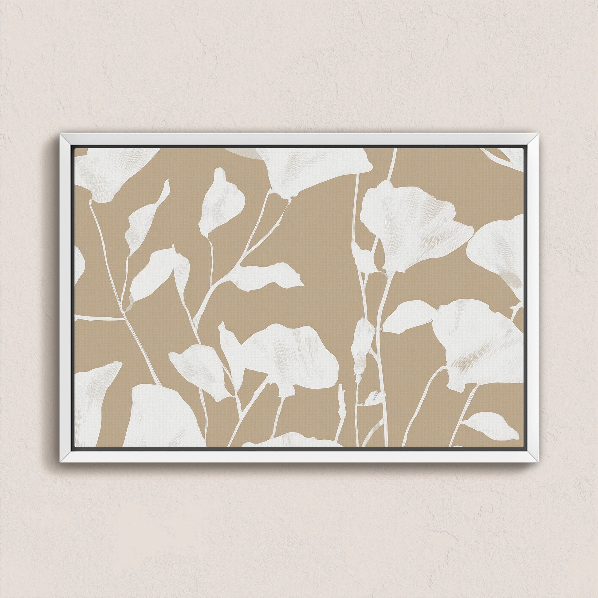 Driftleaf Canvas Print with white floral silhouettes on beige background in white frame