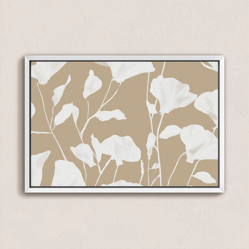 Driftleaf Canvas Print with white floral silhouettes on beige background in white frame