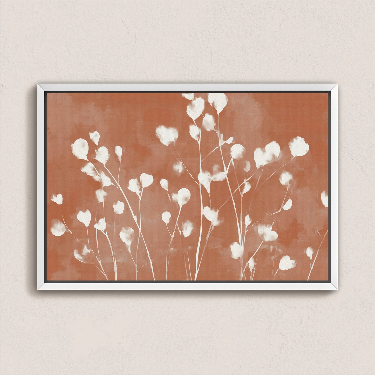 Ember Canvas Print featuring soft white petals on a terracotta background in a sleek white frame